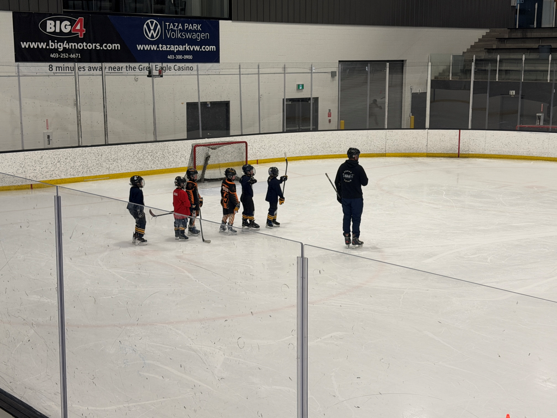 Young players lined up at the net during 7-Chiefs session